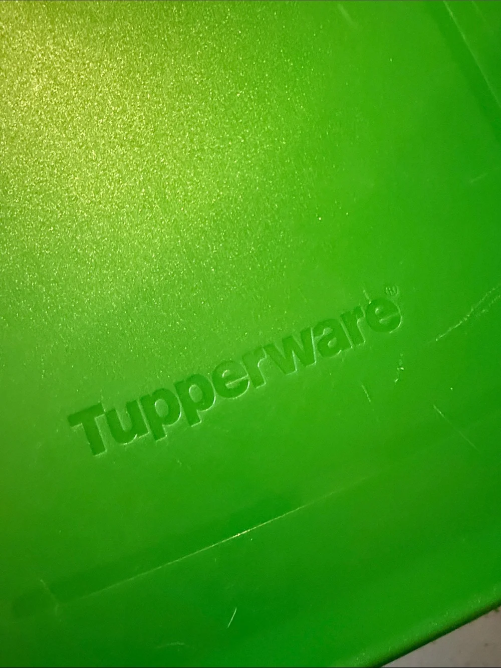 Tupperware Clear Container with Green Lid and Vegetable Graphic